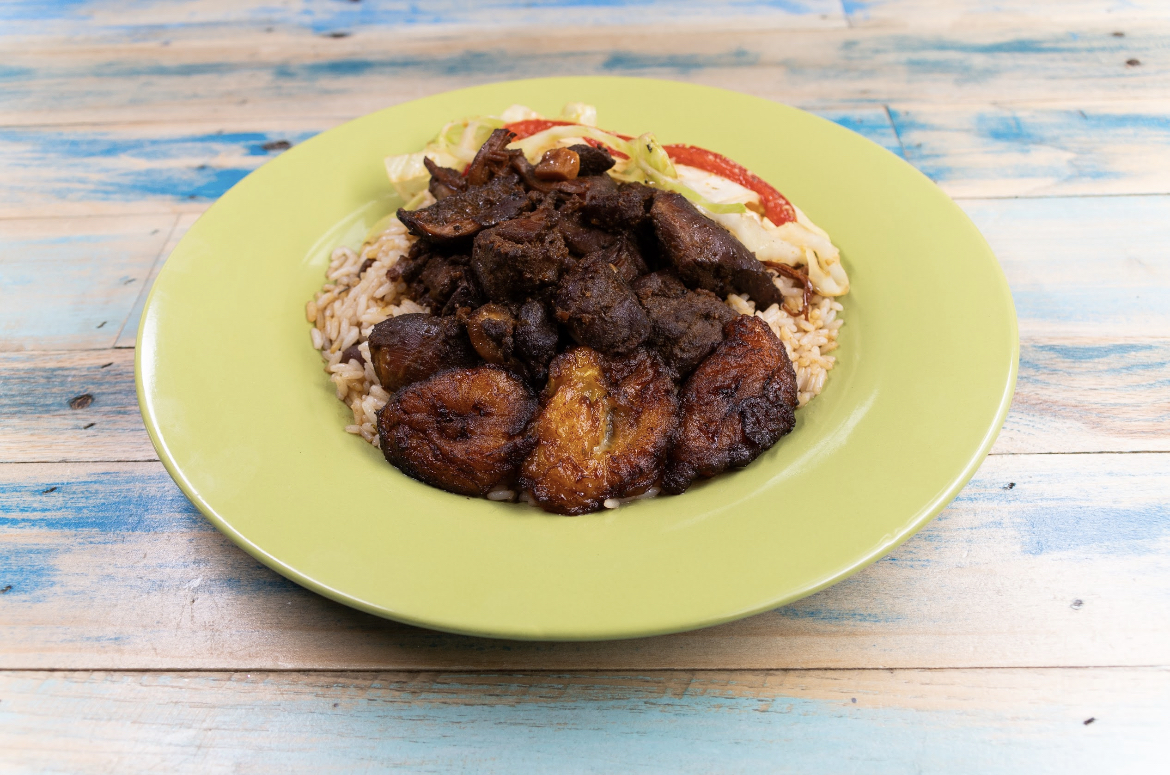 The Rollin Pitt oxtail plate with rice and peas, cabbage and plantains